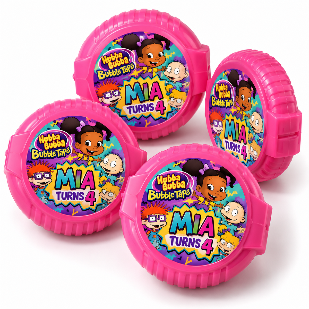 Four pink plastic bubble tape dispensers with colorful cartoon Rugrats labels reading 'Hubba Bubba Bubble Tape' and 'MIA TURNS 4', arranged on a white background.