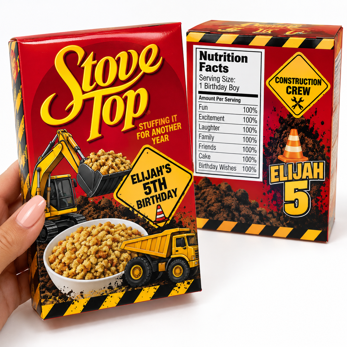 A hand holds a red construction-themed cereal box labeled 'Stove Top' with a bowl of cereal and construction vehicle graphics. A second view of the same box is shown behind it, displaying the Nutrition Facts panel and a yellow 'Construction Crew' badge with 'Elijah 5'.